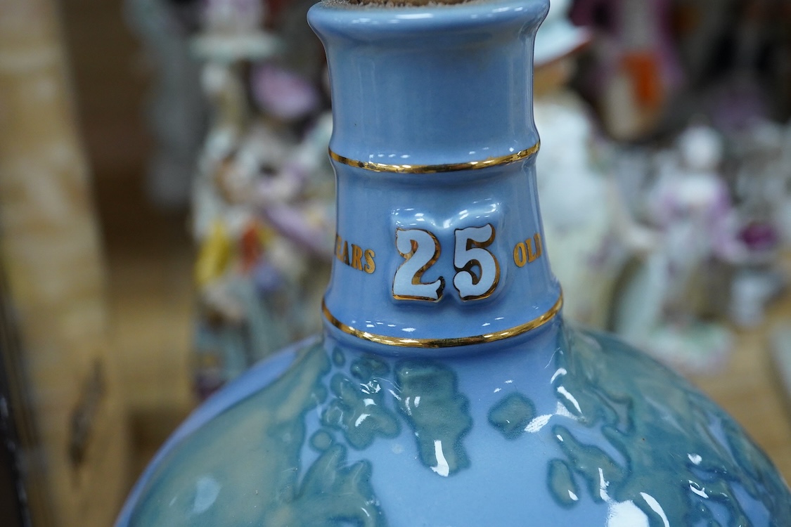 A boxed bottle of Glenturret single highland malt whisky, housed in a globe decanter